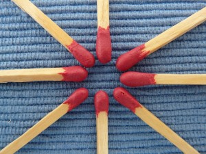 Matchsticks on a fabric background